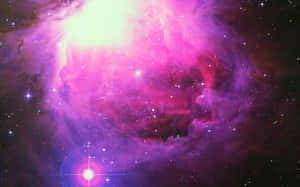 在深空中帶有發光星星的充滿活力的粉紫色星雲。 — 美學粉紅 壁紙