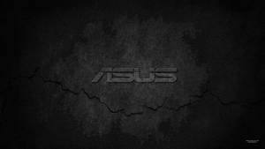 ASUS 標誌在裂開的深色混凝土背景上