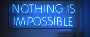 藍色霓虹燈牌在網格牆上寫著 nothing is impossible。 — 3440x1440 壁紙