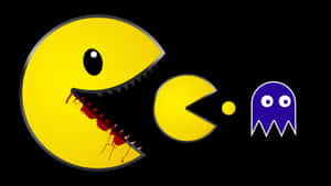 牙齒沾血的 Pacman 追逐一個較小的 Pacman 和一個紫色鬼魂。