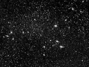 黑色背景上佈滿閃爍星星的星空夜空。