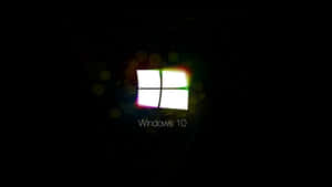 Windows 10 標誌在深色背景上帶有彩色鏡頭光暈
