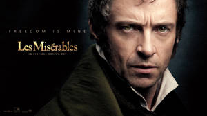 Hugh Jackman 在《悲慘世界》電影海報中飾演 Jean Valjean，眼神強烈。
