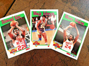 三張1991年NBA交易卡， featuring Bernard King、Magic Johnson和Moses Malone。