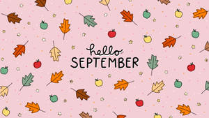 Hello September 問候，粉紅色背景上有落葉、蘋果和星星。