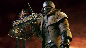 一名重裝士兵在發光的 New Vegas 標誌前手持手槍。