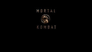 Mortal Kombat 標誌，龍形徽章在黑色背景上發出金色光芒 — Studio Display 壁紙