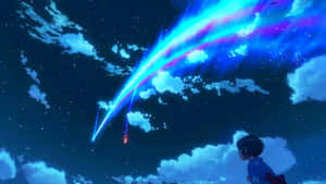 女孩看著一顆發光的彗星在星空中劃出弧線。