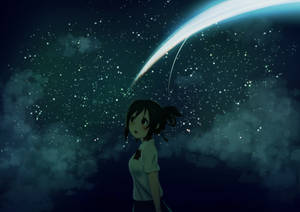 動漫女孩在星空夜空中觀看明亮的彗星。