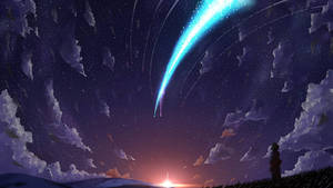 一個人在暮色中觀看星空紫色天空中發光的藍色彗星。 — 你的名字 GIF 壁紙