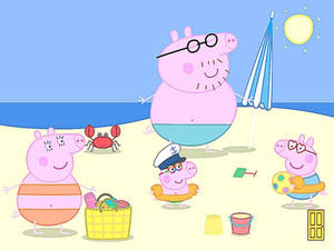 Peppa Pig 一家在陽光下與蟹和玩具在海灘上