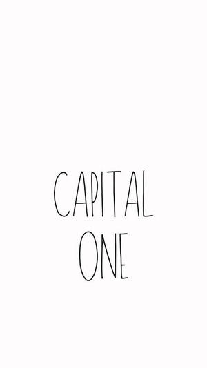 白色背景上以黑色手寫字體顯示的Capital One標誌。