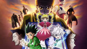 來自《Hunter x Hunter》的動漫角色在熾熱的日落前英勇地擺出姿勢。 — 動漫打鬥 壁紙