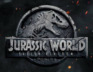 Jurassic World: 殞落國度標誌，裂開的石頭和飛舞的火星。