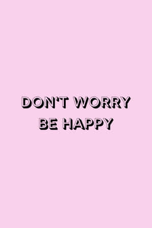 粉紅背景上帶有粗體黑色勵志文字 'DON'T WORRY BE HAPPY'。