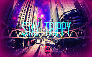 霓虹燈照亮的城市街道，星空紫色天空下，帶有'STAY TRIPPY'文字。