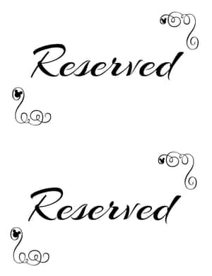 白色背景上兩個帶有米奇老鼠漩渦的「Reserved」文字短語。