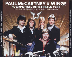 1980 年排練期間 Paul McCartney 與 Wings 的樂隊照片，包含樂器。 — 基斯保羅 壁紙