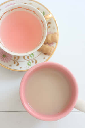 白色木桌上兩杯茶和餅乾。 — IQOO Pad5 Pro 壁紙