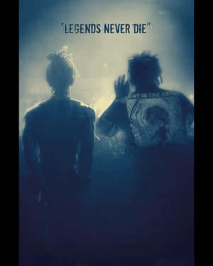 兩個剪影人物，上方有發光的文字 legends never die。