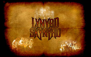 Lynyrd Skynyrd 樂團以復古棕褐色調和醒目的紅色標誌表演。