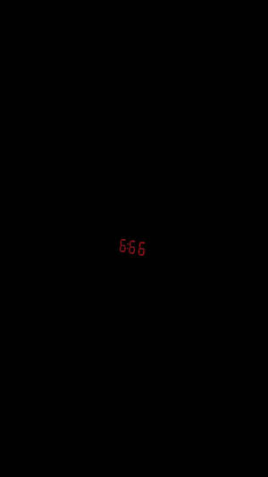 紅色數字時鐘在黑色背景上顯示6:66。