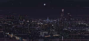 像素藝術城市夜景，帶有發光的窗戶和滿月。