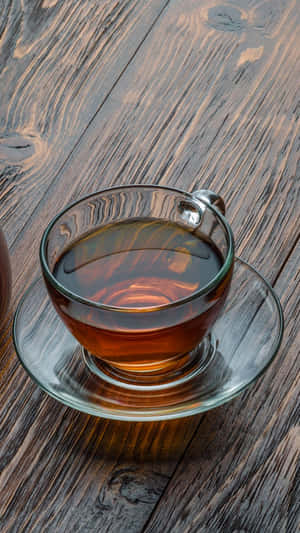 木枱上嘅一杯茶 — 青綠色 GIF 壁紙