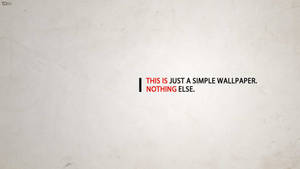 在有紋理的背景上顯示「THIS IS JUST A SIMPLE WALLPAPER. NOTHING ELSE.」的文字 — 簡約桌面壁紙