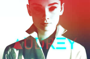 一個女性肖像，帶有紅色和青色燈光，以及發光文字的名字AUDREY。