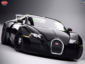黑色Bugatti Veyron 8超級跑車在攝影棚中，帶有鍍鉻細節
