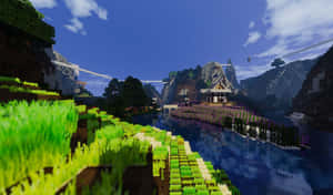 一個Minecraft場景，有山脈、河流和一座木橋，在藍天下。 — 我的世界 壁紙