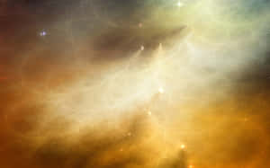 深空中色彩繽紛的星雲，帶有發光雲團和明亮恆星。 — 金粉 壁紙