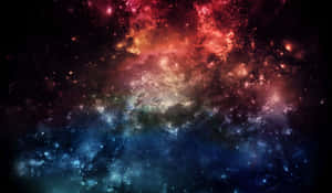 色彩繽紛的宇宙星雲，在黑色太空背景下呈現紅色和藍色色調的星星。 — Realme 壁紙