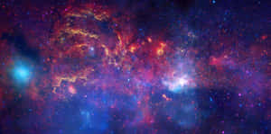 色彩繽紛的星雲，在深空中帶有發光的氣體雲和星星。 — 夜空 壁紙