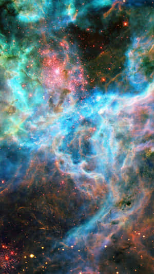 色彩繽紛的宇宙星雲，帶有發光的氣體雲和散落的星星。 — 手機 壁紙