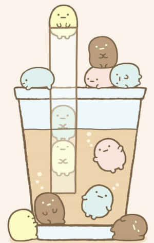 珍珠奶茶杯內部和周圍的可愛 Sumikko Gurashi 角色。 — Moto Pad 60 Lite 壁紙