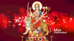 女神Vaishno Devi騎著老虎，飾以金色和紅色，被節日燈光環繞。 — 鬼滅之刃 善逸 壁紙