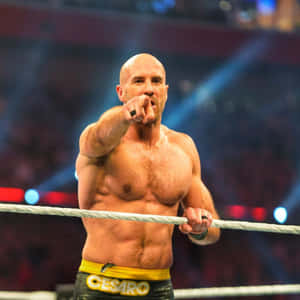 摔角手Cesaro在現場活動中於擂台指向鏡頭。 — 摔角 GIF 壁紙