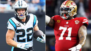 兩名NFL美式足球運動員在比賽中，一名持球，另一名慶祝。