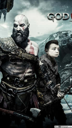God of War 戰士與男孩在雪地山區地形中。