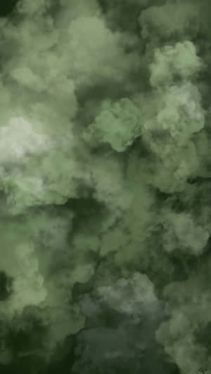 在陰鬱的大氣紋理中旋轉的綠色和灰色雲層。