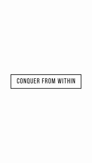 方框內文字寫著 conquer from within。