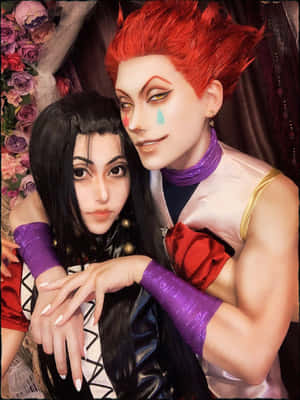 兩位動漫cosplayer以戲劇性的化妝和色彩繽紛的服裝擁抱。 — Hisoka GIF 壁紙