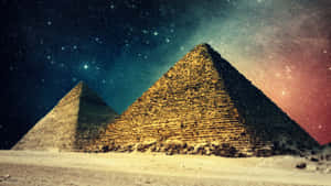 星空下帶有宇宙色彩的兩座金字塔。 — 天際線 壁紙