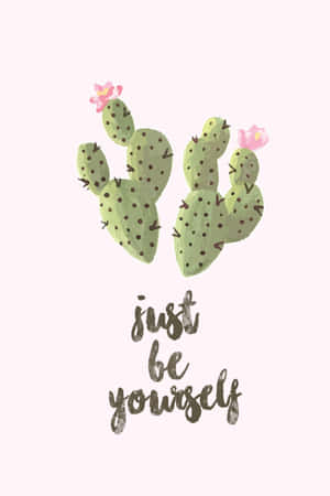 兩棵仙人掌形成心形，帶有粉紅色花朵和短語 just be yourself。 — iPhone Duo 壁紙