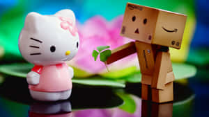 Hello Kitty 從一個紙板亞馬遜機械人手中接過四葉草。 — 三隻熊 壁紙