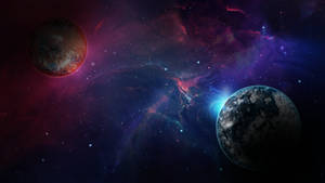 兩顆行星在一個充滿星星和宇宙塵埃的彩色星雲中運行。 — 太空 壁紙