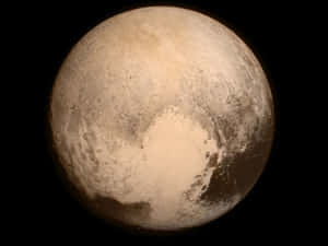 冥王星的冰凍表面，在太空中呈現明暗區域。