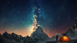 遠足者在星空下從積雪的山間營地凝視銀河。